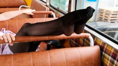 Stinky black pantyhose feet in old school bus foot wors - drtuber